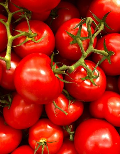 pexels photo 1327838 1327838 Vibrant close-up of fresh cherry tomatoes, showcasing their juiciness and bright red color.